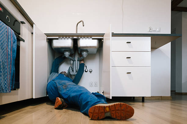 Professional Drain Cleaning technician working in Spring City, TN
